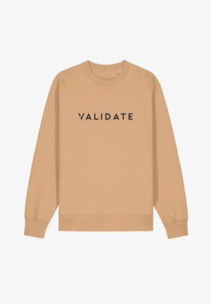 Felpa beige con maniche lunghe, polsini e orlo a costine, caratterizzata da "VALIDATE" in grassetto nero maiuscolo sulla parte frontale.