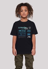 Black t-shirt featuring blue graphic designs of the Citroën CX car, including side and front views, with text detailing specifications.