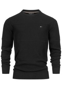 Pull en maille noire avec des rayures horizontales texturées, encolure ronde et poignets et ourlet côtelés. Présente un logo discret sur la poitrine.