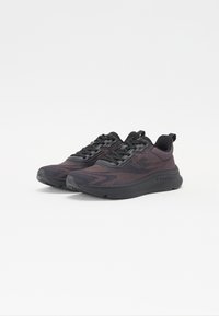 Black athletic shoes with a mesh upper featuring a dark maroon pattern, rounded toe, textured sole, and reinforced heel for support.