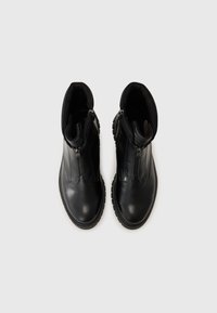 Marco Tozzi Bottines compensées - black comb
