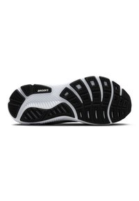 Schwarz-weiße Sport Schuhsohle mit strukturiertem Gummi, ausgestattet mit einem Wellenmuster-Design, Branding und flexiblen Rillen für Traktion.