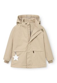 Giacca leggera beige con cappuccio, chiusura con zip e due tasche frontali. Presenta un'etichetta bianca a forma di stella e polsini elasticizzati.