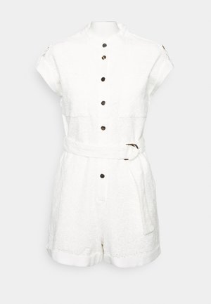 White short-sleeve jumpsuit with a textured pattern, front button closure, two chest pockets, and a belted waist.