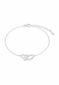 Bracciale in argento con catena che presenta due cuori intrecciati, uno liscio e l'altro decorato con pietre trasparenti, fissato con un moschettone.
