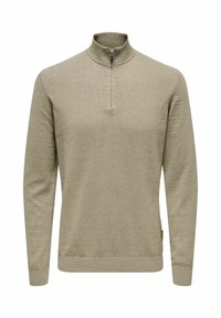 Hellolivegrüner Pullover mit Reißverschluss und Stehkragen, langen Ärmeln sowie gerippten Bündchen und Saum. Aus weichem, strukturiertem Stoff gefertigt.