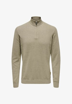 Pull léger vert olive avec un col montant zippé, des manches longues et des poignets et un ourlet côtelés. Fabriqué en tissu doux et texturé.