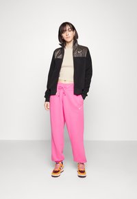 Nike Sportswear W PHNX FLC HR OS - Calças de fato de treino - pinksicle/sail