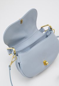 Coccinelle MAGIE SOFT - Handbag - mist blue