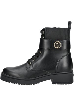 Black leather ankle boots with a chunky sole, round toe, lace-up front, and elastic side panel. Gold logo accent on ankle strap.