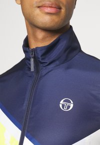 Buy Sergio Tacchini Cryo Tuta Da Allenamento Uomini Bianco, Nero Online - Foto 9