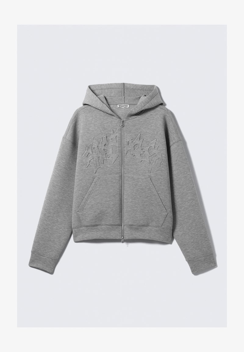 Gray zip-up hoodie made of fleece, featuring a hood, kangaroo pockets, and embossed design on the chest. Soft texture with ribbed cuffs.