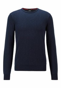 Námořnická modrá pletená svetr s kulatým výstřihem a dlouhými rukávy. Má žebrované manžety a lem, vyrobený z měkké texturované tkaniny.