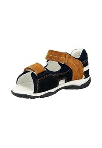 Sandali in suede blu navy con accenti marroni, due cinturini regolabili in velcro, design aperto sulla punta e suola bianca con grip testurizzato.
