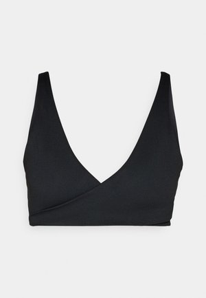 Mustikkapinkki kietaisutyyppinen bikinitoppi, jossa on syvä V-pääntie, leveät hihnat ja sileä, joustava kangas mukavuutta ja tukea varten.