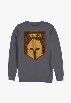 Dunkelgraues Sweatshirt mit einem gold- und braunen Mandalorian-Helm-Design und dem Text „MANDALORIAN ARMORER“ auf der Vorderseite.