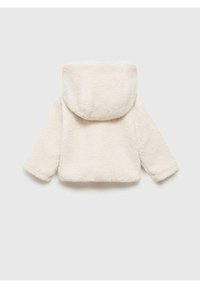 Kremowa polarowa kurtka z kapturem, o miękkiej fakturze, długich rękawach i krótkim kroju. Brak widocznych zapięć lub wzorów.