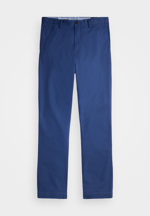 Chinos de algodão azul-marinho com um design de perna reta, apresentando um fecho frontal com botão e bolsos laterais, textura suave e costura limpa.