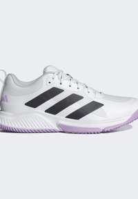 White athletic shoe with a textured upper, black three-stripe design, and a purple rubber sole. Features a lace-up closure and padded collar.