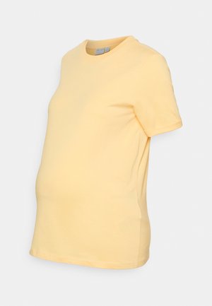 T-shirt de maternidade amarelo feito de algodão macio, apresenta mangas curtas, um decote redondo e um corte suavemente curvado para acomodar uma barriga em crescimento.