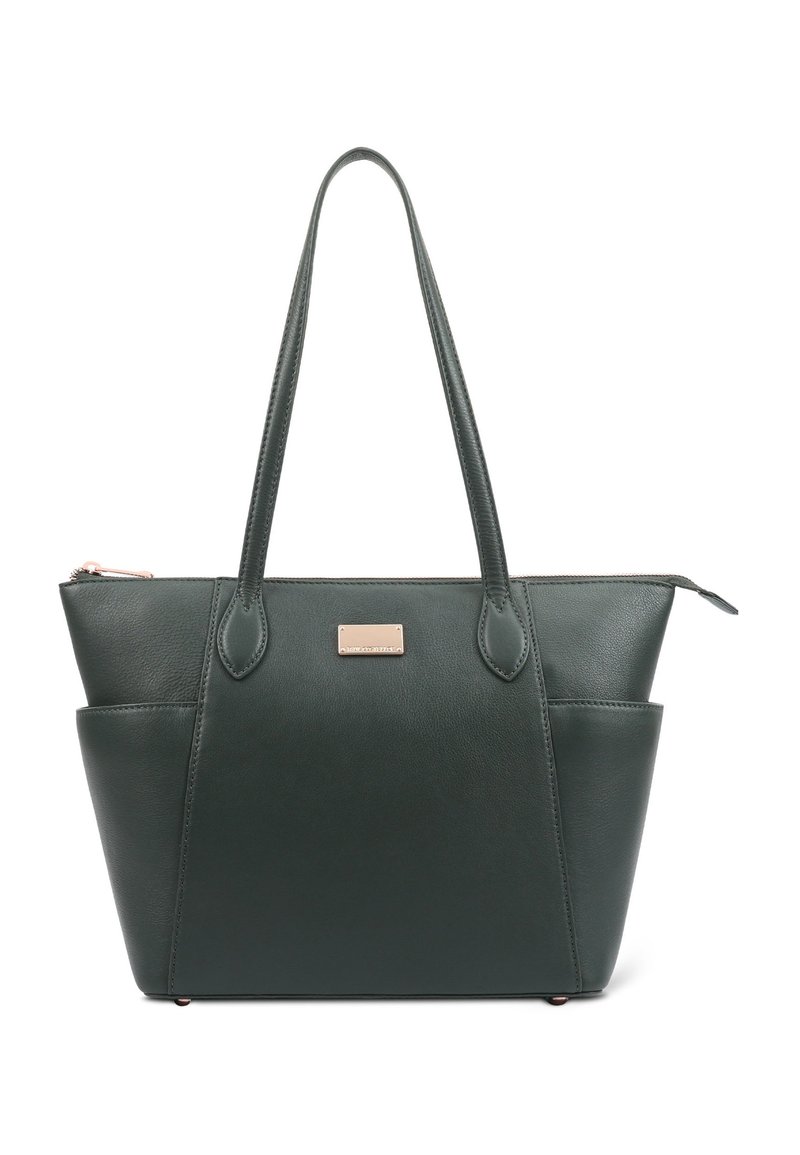 Sac fourre-tout en cuir vert foncé avec deux poignées supérieures, une fermeture éclair et des poches latérales extérieures. Doté d'une petite plaque logo métallique.