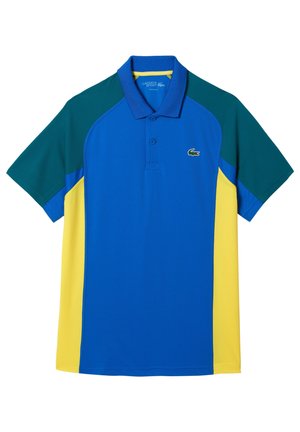 Blå og grøn polo shirt med gule detaljer, en traditionel krave, og et lille broderet logo på brystet.