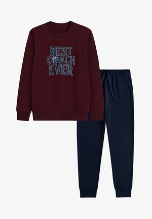 Burgundy sweatshirt with "BEST COACH EVER" graphic and navy jogger pants. Soft fabric, ribbed cuffs, and elastic waistband for comfort.