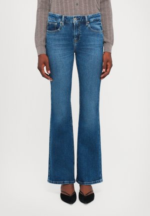 Bredde denim jeans i mørk blå med klassisk fem-lomme design, knappelukking og synlig søm. Glatt tekstur og subtil falming.