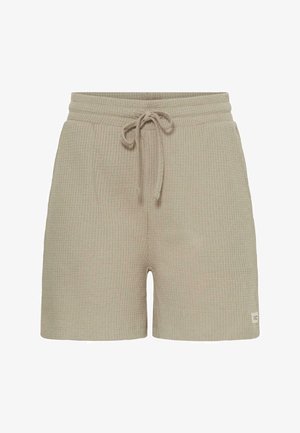 Beige bordázott lounge rövidnadrágok megkötős derékpánttal és oldalsó hasítékokkal. Puha tapintású, térd közepéig érő hosszúságú, oldalán márkajelzéssel.