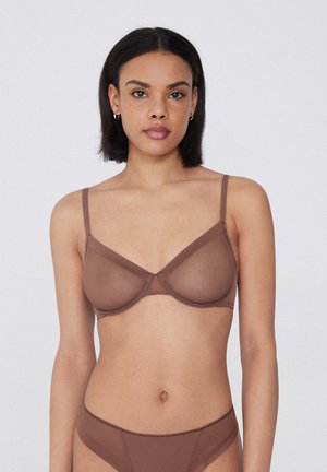 Tezenis - Biustonosz z trójkątną miseczką