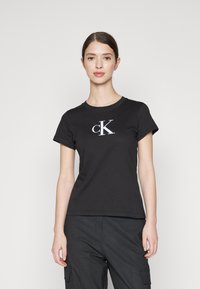 Calvin Klein Jeans SLIM TEE - T-shirt med print - black