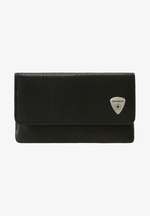 Black leather wallet with a textured finish. Features a silver logo plate and a flap closure. Compact rectangular shape with visible stitching.