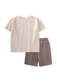 Cigit SUNSHINE DAYS SET - Pantalones deportivos - off white