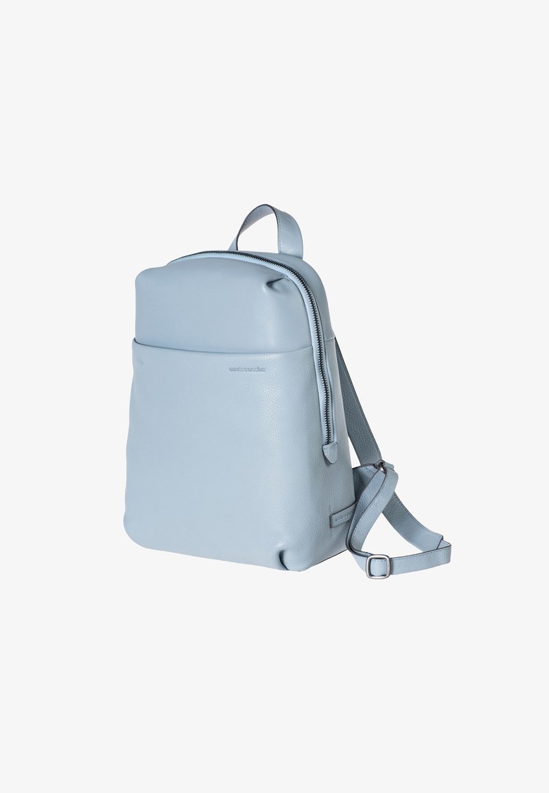 Light blue leather backpack featuring a zip closure, a front pocket, and adjustable straps, with a smooth texture and minimalistic design.