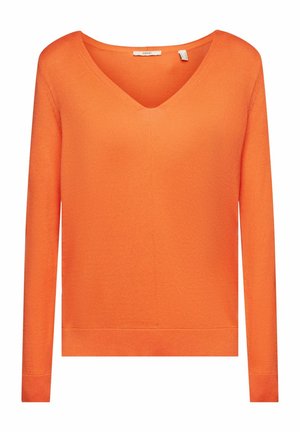 Jasnopomarańczowy sweter z długim rękawem, dekoltem w serek oraz ściągaczami na dole i na mankietach, wykonany z gładkiego dzianego materiału, przeznaczony do noszenia na co dzień.