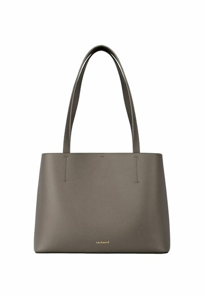 Sac fourre-tout en cuir gris avec double poignée et petit logo doré "cacharel" centré près du bas.