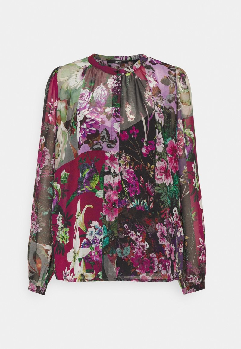 Blusa a maniche lunghe con bottoni, caratterizzata da un vivace motivo floreale e uccelli in tonalità di viola, rosa, verde e nero su tessuto trasparente.