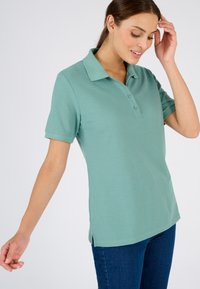 Damart Polo - vert grisé