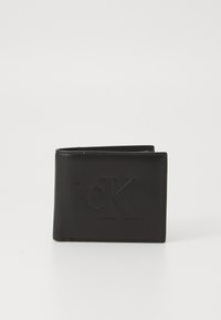 Portefeuille en cuir noir avec logo "CK" en relief, design bi-fold, bords nets et finition texturée. Forme compacte pour un transport facile.