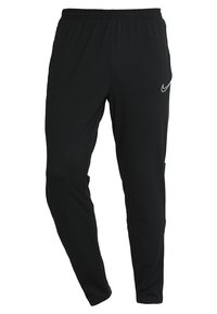 Schwarze Sporthosen aus leichtem Material, mit einem elastischen Bund, taillierten Hosenbeinen und einem kleinen weißen Logo in Hüfthöhe.