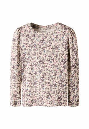 Langærmet cremefarvet skjorte med lille lilla, blå og pink blomsterprint og let rynkning ved skuldersømmene.