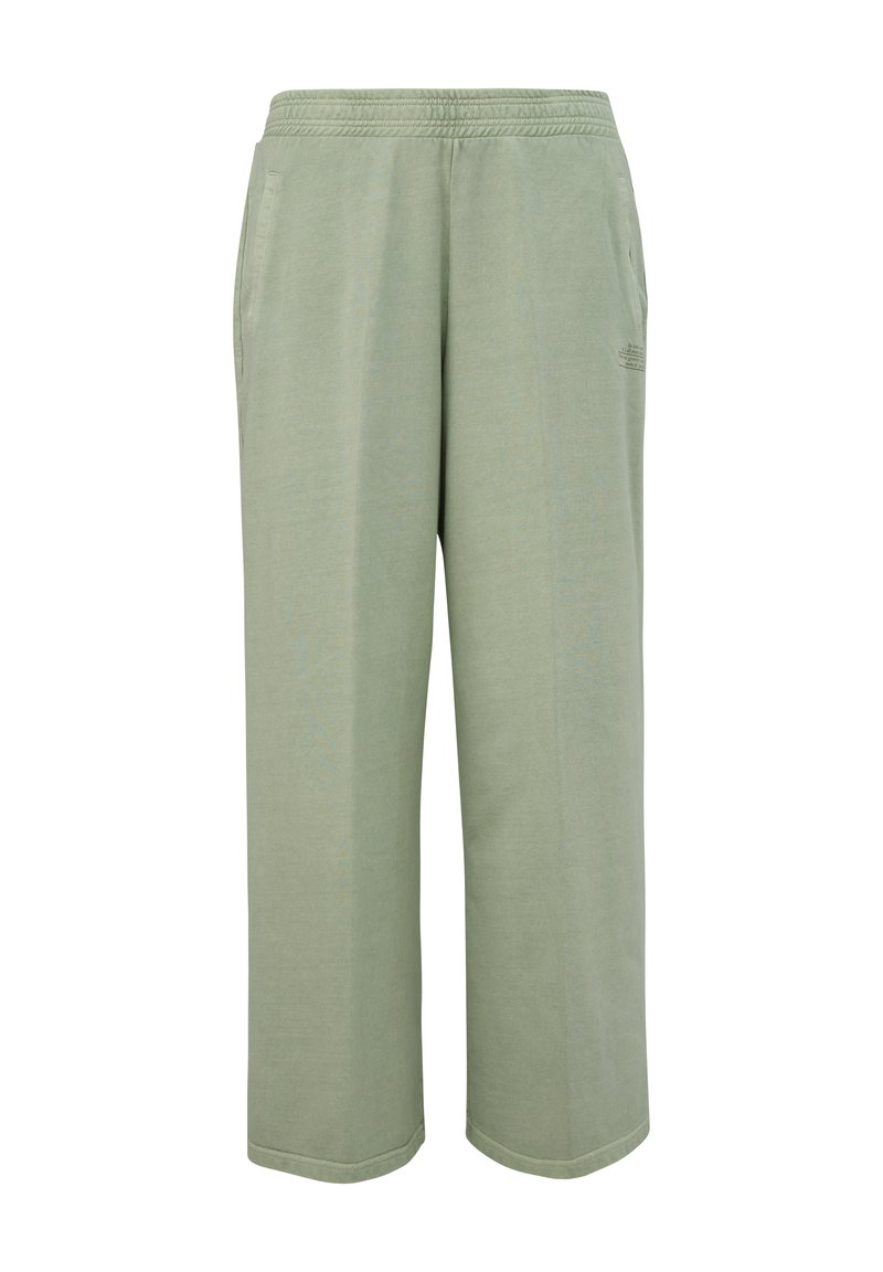 Helles grünes, dehnbares Baumwoll-Hosen mit lässigem Schnitt, elastischem Bund und Seitentaschen. Schlichtes Design ohne sichtbare Muster oder Akzente.