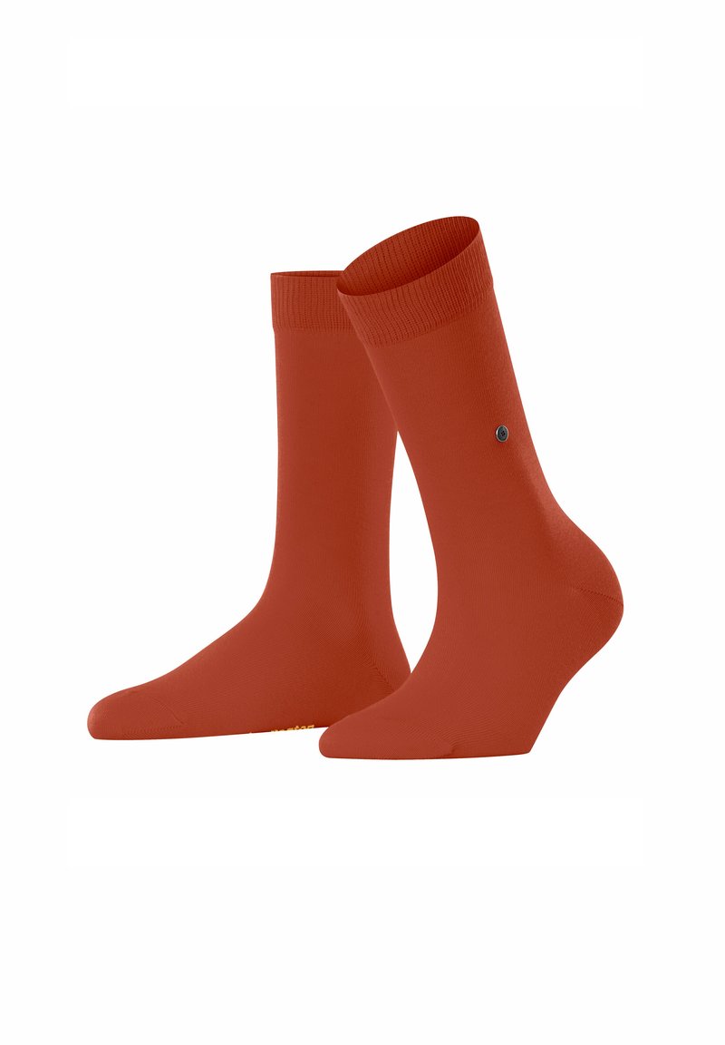 Deux paires de chaussettes orange vif sont exposées ensemble, présentant une texture de tissu lisse et un design simple.