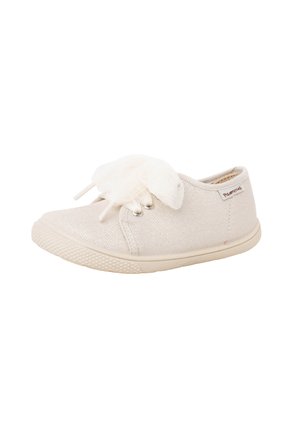 Baskets en toile beige pour filles avec semelle en caoutchouc et grand nœud blanc décoratif sur le devant à lacets.