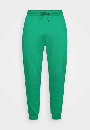 Pantalon jogger slim-fit vert avec taille élastique et cordon, jambes fuselées et poignets côtelés.