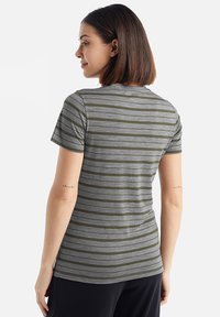 Gray short-sleeve t-shirt with horizontal green stripes, smooth texture, rounded neckline, and a fitted shape.