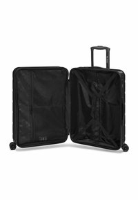 Valise rigide noire avec double fermeture éclair, poignée télescopique et quatre roues pivotantes. L'intérieur comprend une poche en maille et des sangles réglables.