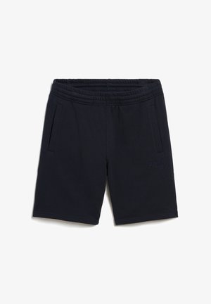 Marineblå træningsshorts lavet af blødt stof, med elastisk talje, sidelommer og et diskret logo nær kanten.