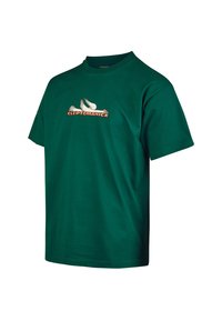 Green cotton t-shirt with a crew neckline. Features a printed logo in orange and white depicting stylized birds above the word "CLEPTOMANICX."