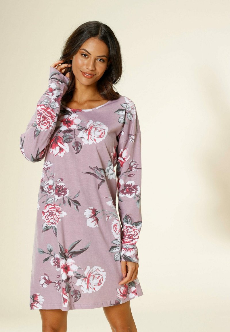 Long-sleeve floral dress in soft mauve fabric, featuring large rose patterns in white and red. Scoop neckline and relaxed fit.